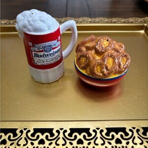 Vintage Budweiser and pretzel bowl salt and pepper shakers .